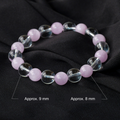 Clear and purple bead bracelet, approximately 9 mm clear beads and 8 mm purple beads