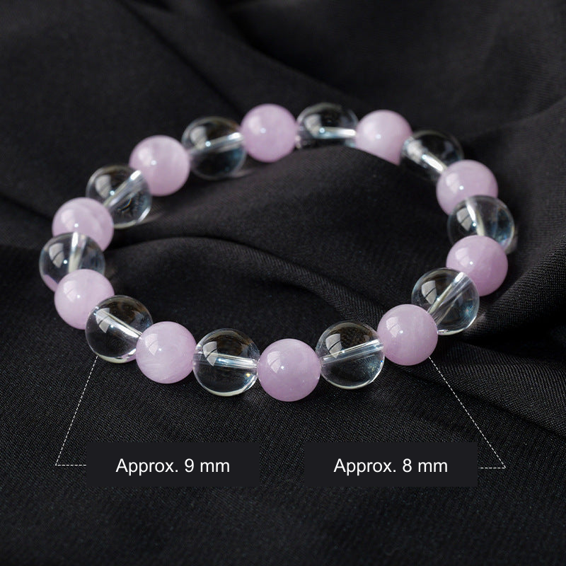 Clear and purple bead bracelet, approximately 9 mm clear beads and 8 mm purple beads