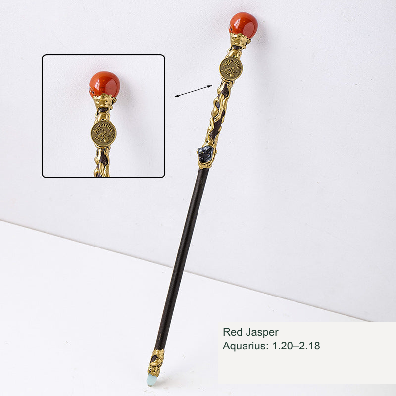 Actual zodiac wand; original stone and engraving retained, equivalent English source label