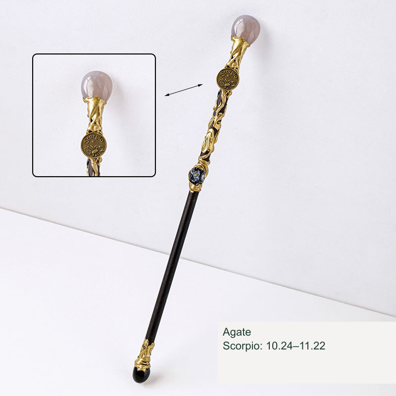 Actual zodiac wand; original stone and engraving retained, equivalent English source label