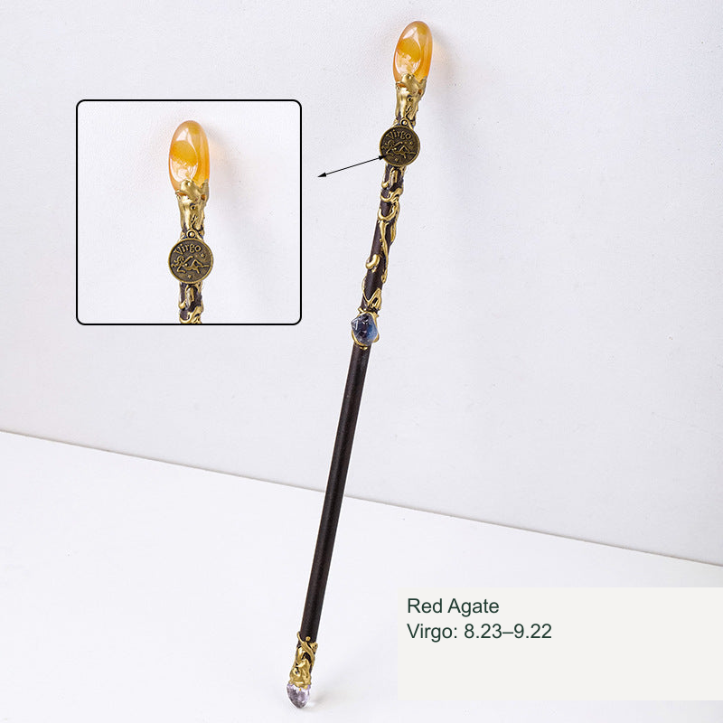 Actual zodiac wand; original stone and engraving retained, equivalent English source label