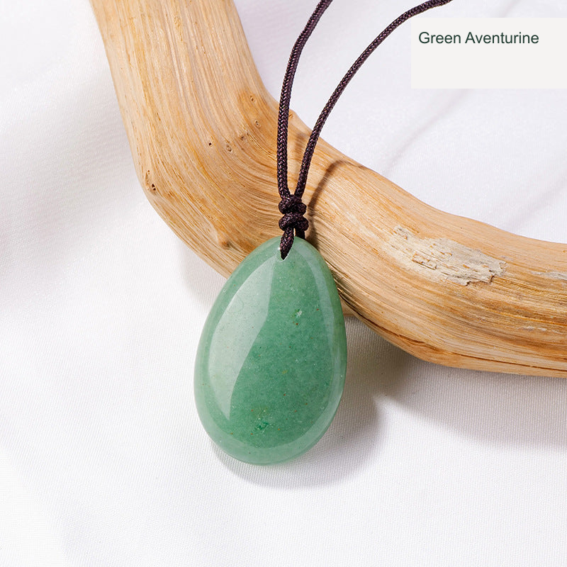 Actual pendant SKU photograph; original product, cord and tree detail preserved, equivalent English source label