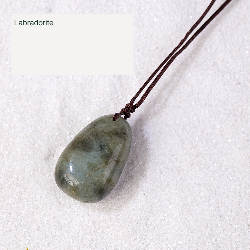 Actual pendant SKU photograph; original product, cord and tree detail preserved, equivalent English source label