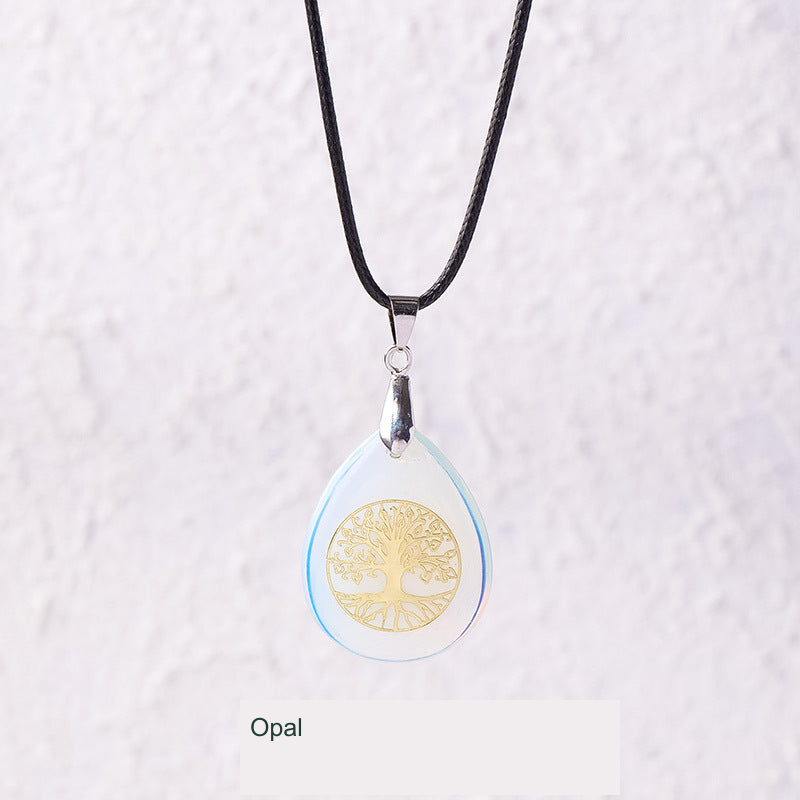 Actual pendant SKU photograph; original product, cord and tree detail preserved, equivalent English source label
