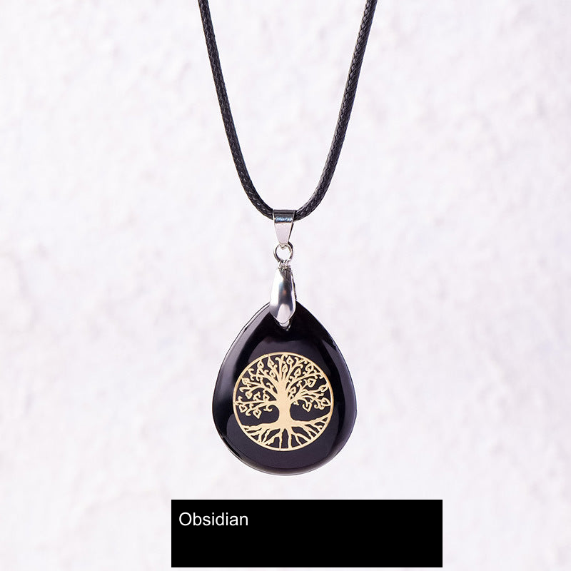 Actual pendant SKU photograph; original product, cord and tree detail preserved, equivalent English source label