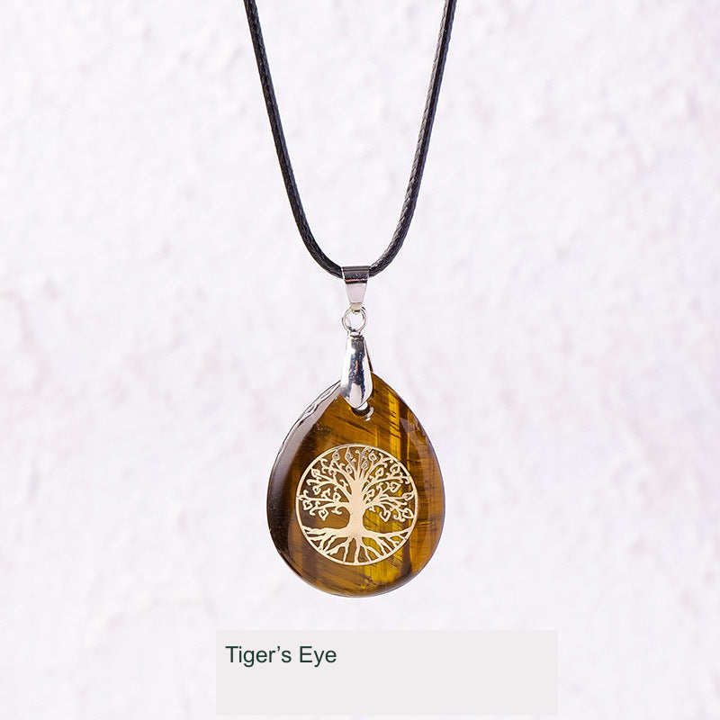 Actual pendant SKU photograph; original product, cord and tree detail preserved, equivalent English source label