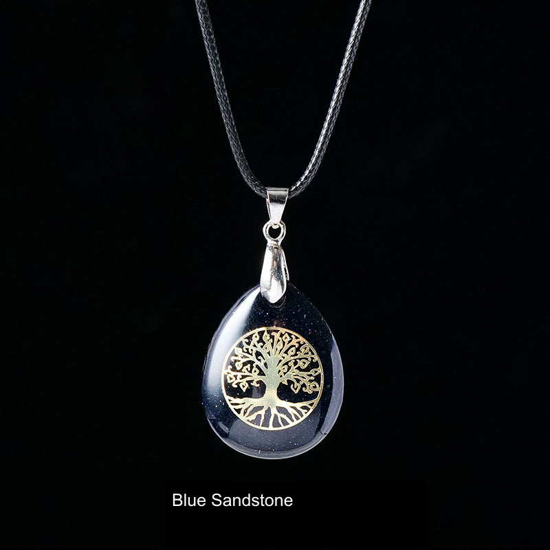Actual pendant SKU photograph; original product, cord and tree detail preserved, equivalent English source label