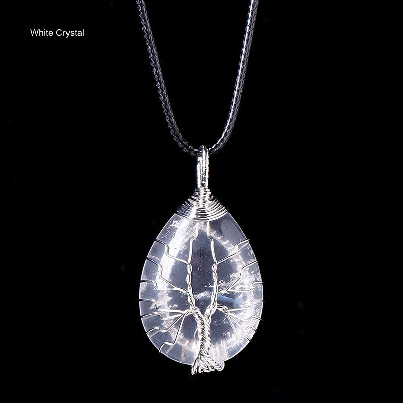 Actual pendant SKU photograph; original product, cord and tree detail preserved, equivalent English source label