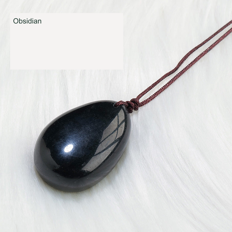 Actual pendant SKU photograph; original product, cord and tree detail preserved, equivalent English source label