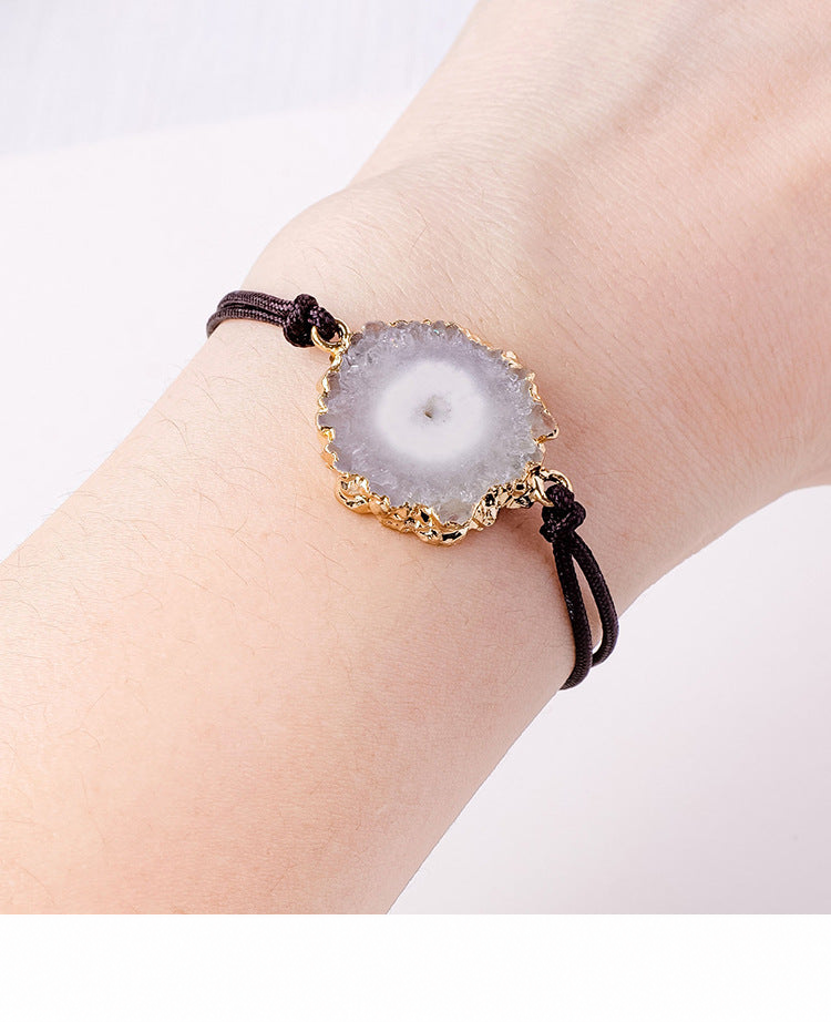 Agate slice bracelet worn on a wrist; original product photo preserved