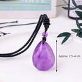 Amethyst teardrop cord pendant, original photograph with English 2.5–4 cm size reference