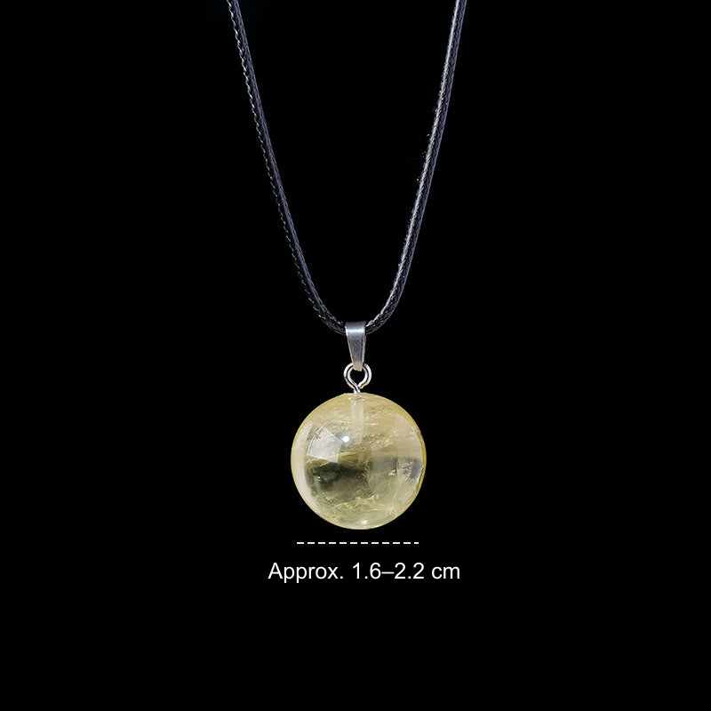 Yellow Crystal sphere pendant; English photo size reference
