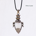 Ornate antique-bronze-color stone pendant; original photograph with English material label.