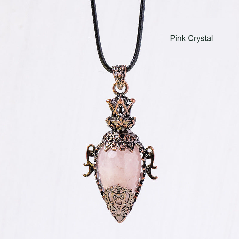 Ornate antique-bronze-color stone pendant; original photograph with English material label.