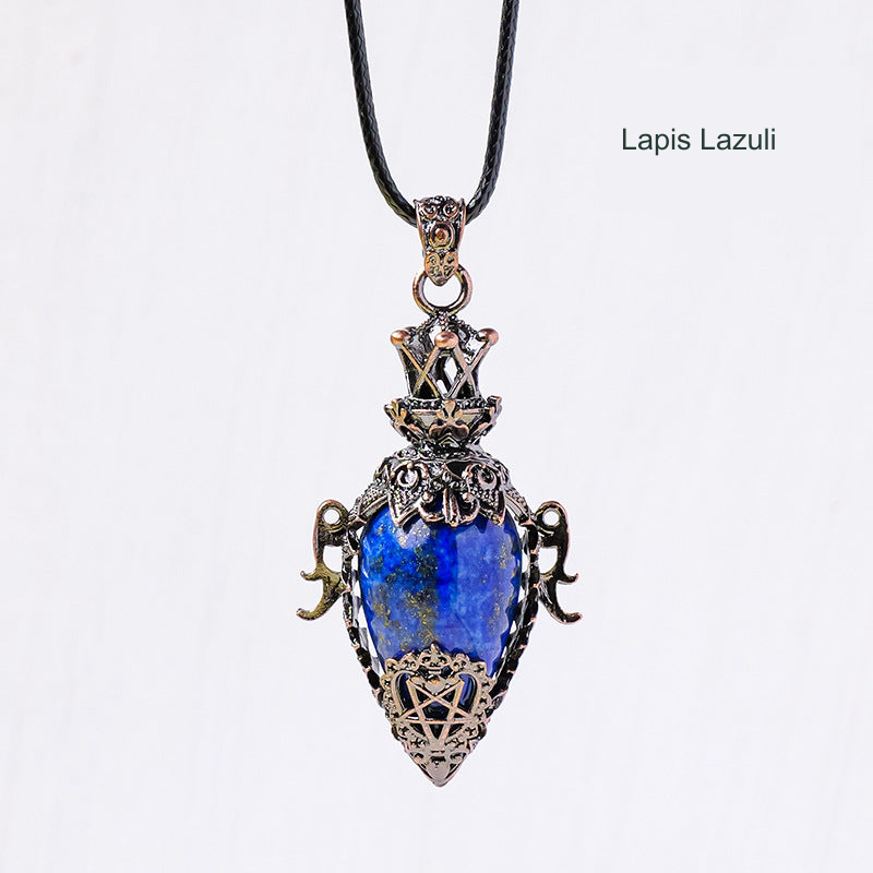 Ornate antique-bronze-color stone pendant; original photograph with English material label.