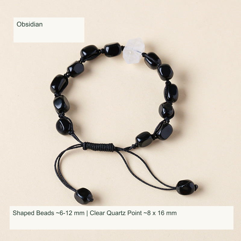 Original double-point quartz and shaped stone cord bracelet with English supplier material and size labels; product unchanged