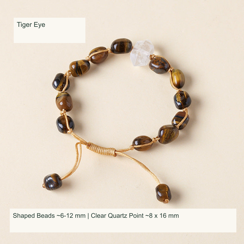 Original double-point quartz and shaped stone cord bracelet with English supplier material and size labels; product unchanged