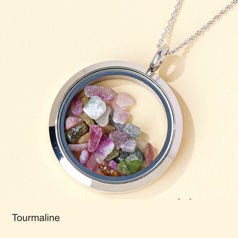 Original stone-filled circular pendant photo with equivalent English label; real contents, frame and chain unchanged
