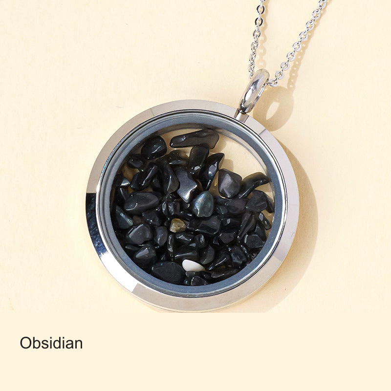Original stone-filled circular pendant photo with equivalent English label; real contents, frame and chain unchanged