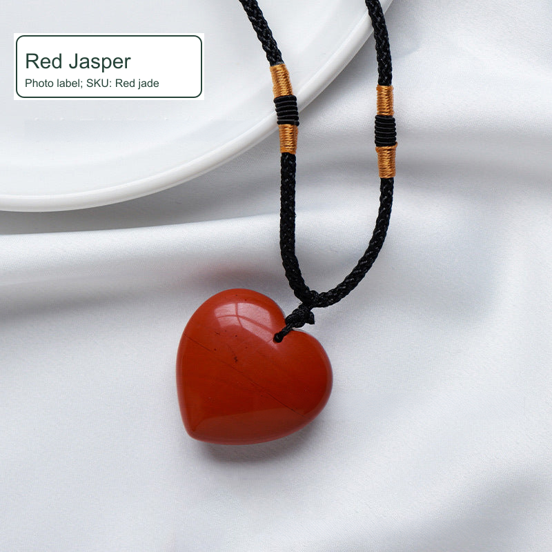 Red jade heart pendant; original photo locally cleaned and English labels