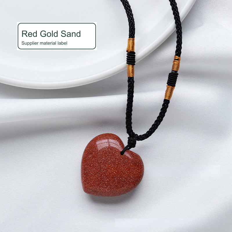 Red gold sand heart pendant; original photo locally cleaned and English labels