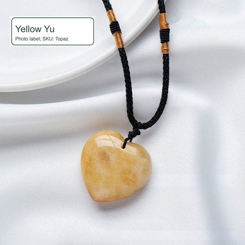 Heart-shaped cord necklace — Yellow Yu; Photo label; SKU: Topaz