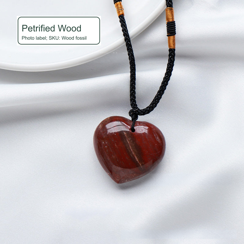 Heart-shaped cord necklace — photo label Petrified Wood; SKU Wood fossil