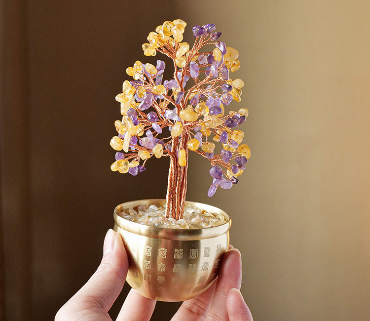 Actual tree and blessing bowl held by the base — unaltered photograph crop
