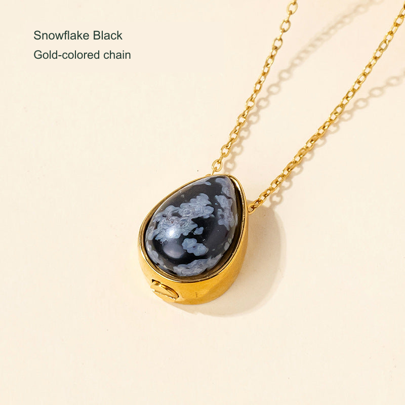 Stone teardrop keepsake pendant — original selected SKU photograph with English material and chain-color label