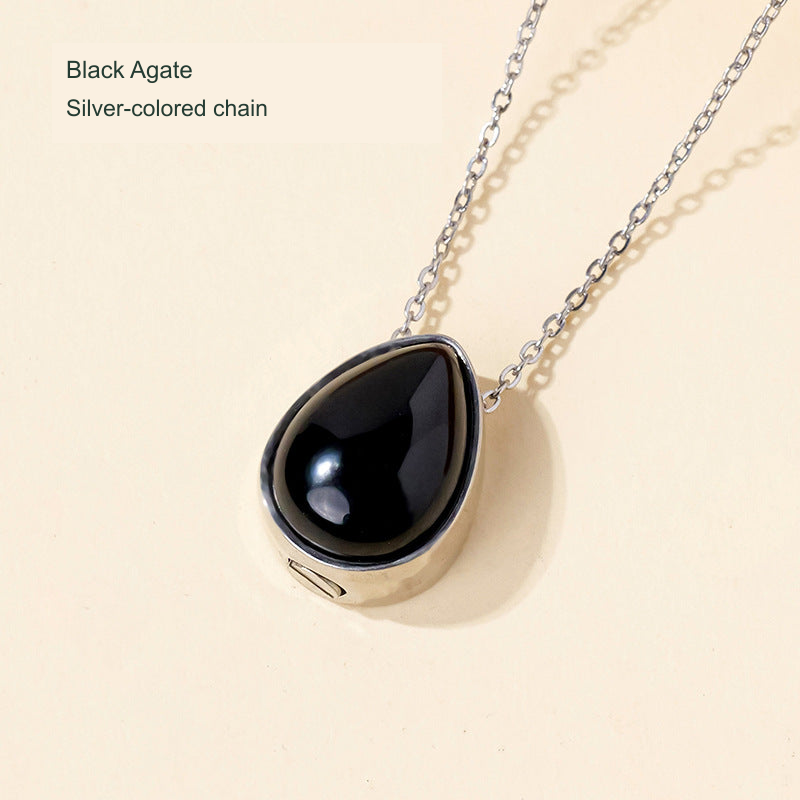 Stone teardrop keepsake pendant — original selected SKU photograph with English material and chain-color label