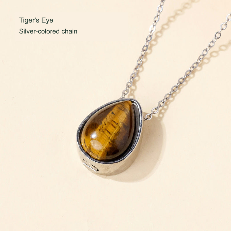 Stone teardrop keepsake pendant — original selected SKU photograph with English material and chain-color label
