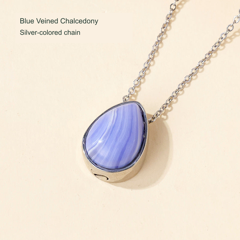 Stone teardrop keepsake pendant — original selected SKU photograph with English material and chain-color label