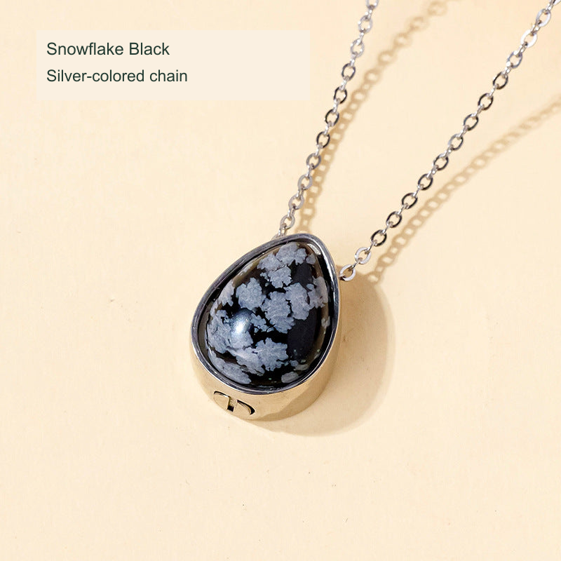 Stone teardrop keepsake pendant — original selected SKU photograph with English material and chain-color label
