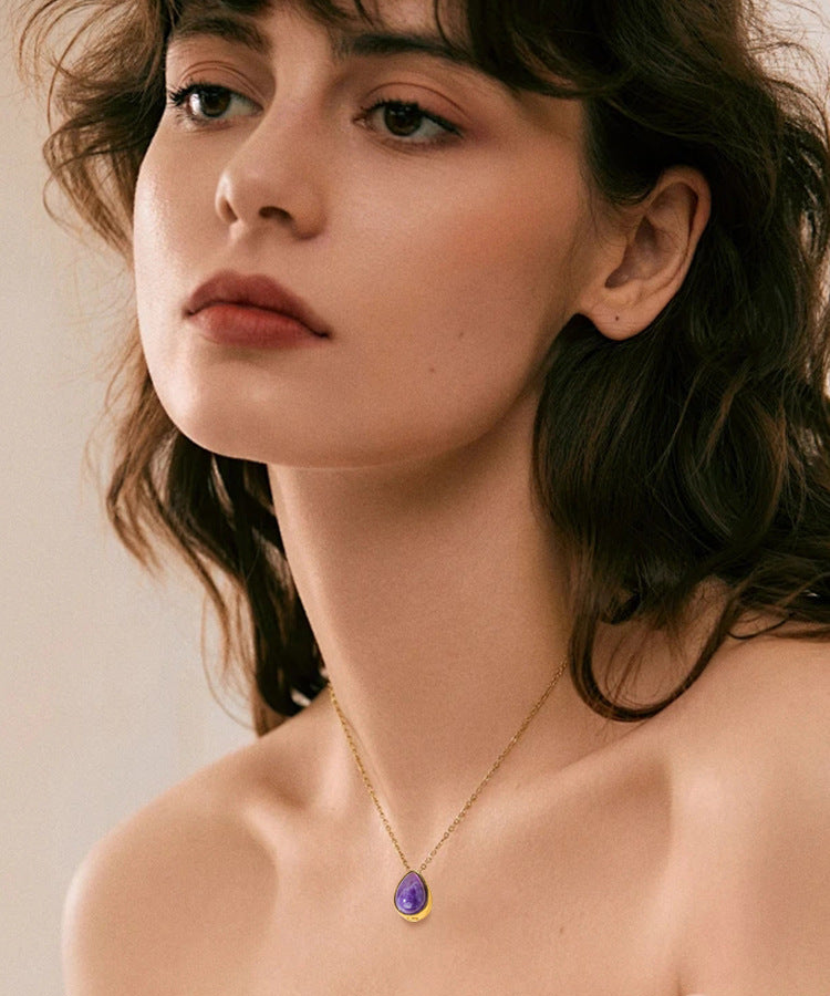 Original wearing reference of amethyst keepsake necklace, supplier overlay removed by cropping