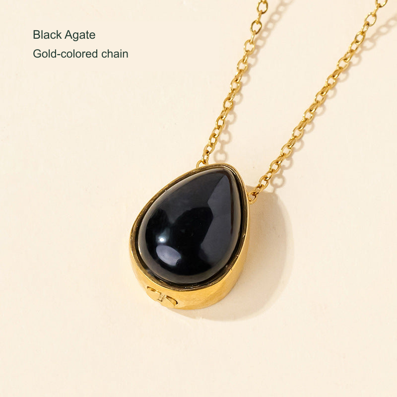 Stone teardrop keepsake pendant — original selected SKU photograph with English material and chain-color label