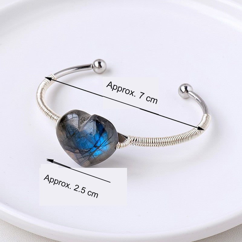 Original selected Labradorite cuff photograph with equivalent English dimension references; actual bracelet and stone unchanged