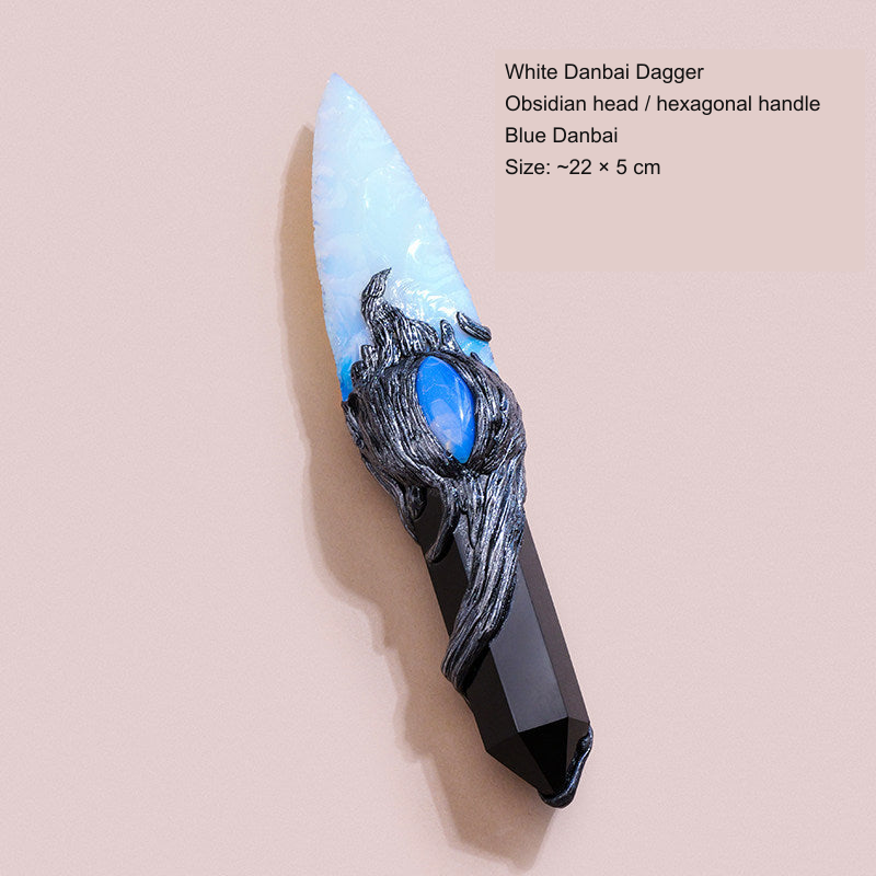 Original photographed collectible option 43 — equivalent English caption: White Danbai Dagger; Obsidian head / hexagonal handle; Blue Danbai; Size: ~22 × 5 cm