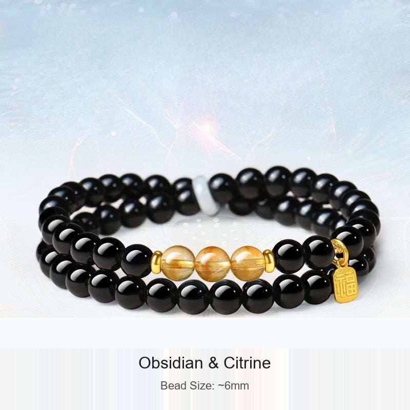 Actual black-bead bracelet with original material and 6 mm size captions preserved; supplier shadow logo removed from background