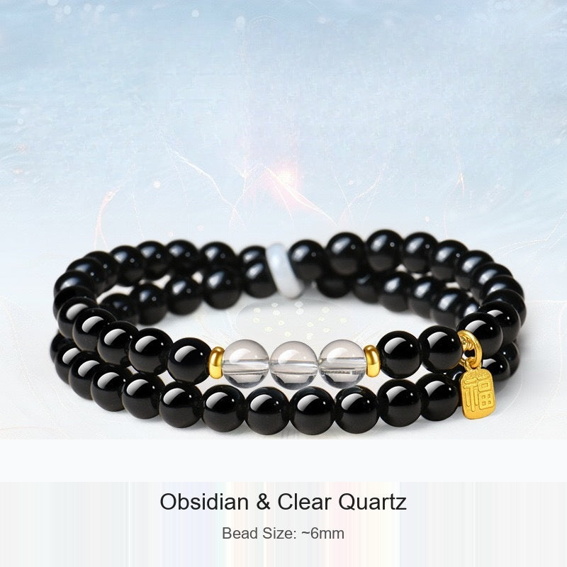 Actual black-bead bracelet with original material and 6 mm size captions preserved; supplier shadow logo removed from background
