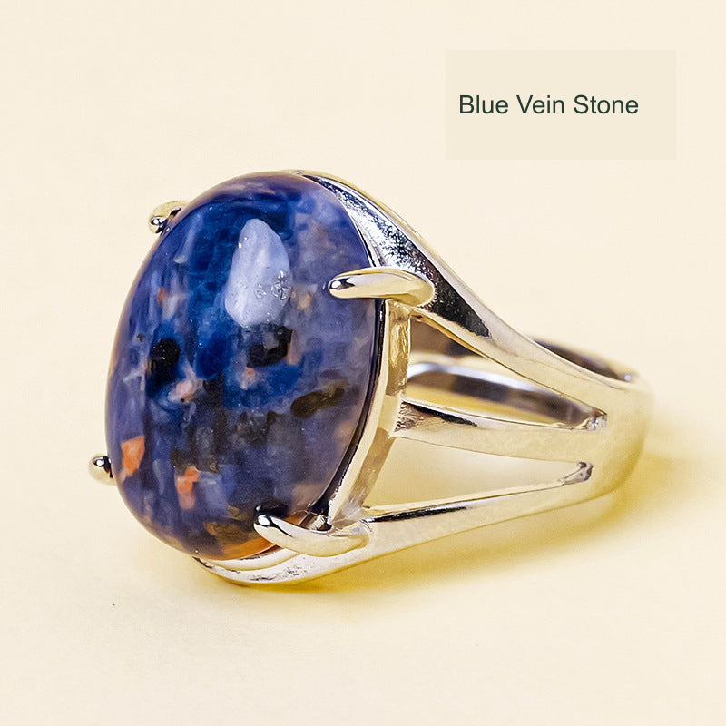 Blue Vein Stone oval ring, unchanged original product photograph with English material label