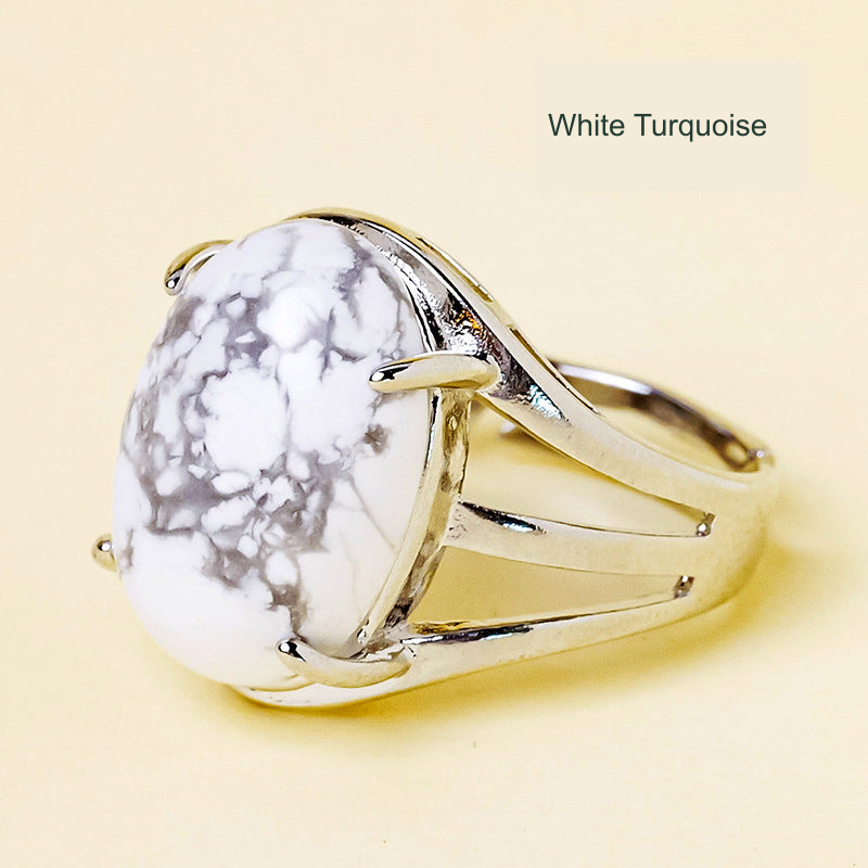 White Turquoise oval ring, unchanged original product photograph with English material label