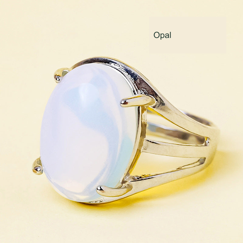 Opal oval ring, unchanged original product photograph with English material label