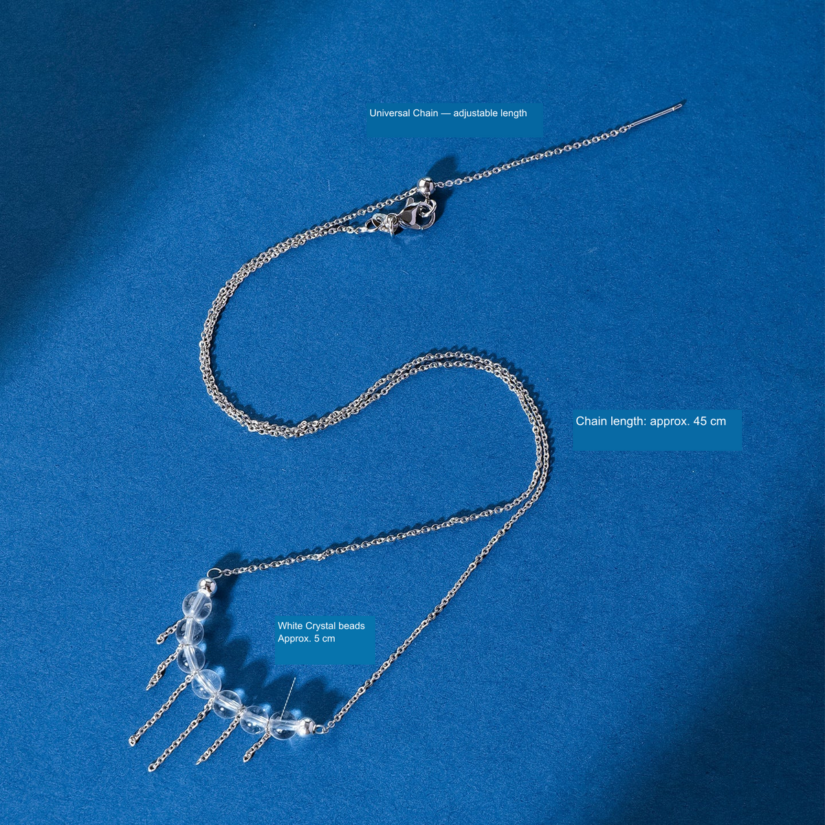 Actual jewelry SKU photograph with literal English material and size labels