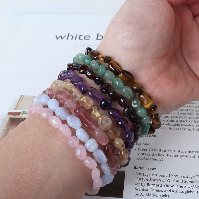Rice-shaped bead bracelets worn together for styling and color comparison