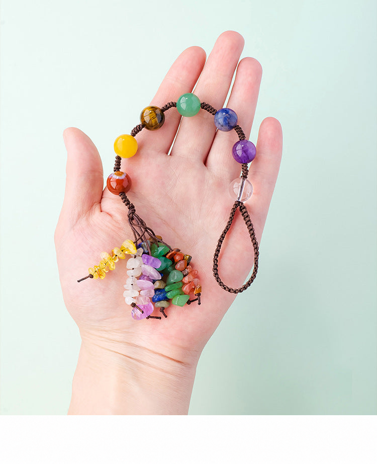 Seven-color beaded hanging ornament held in a hand