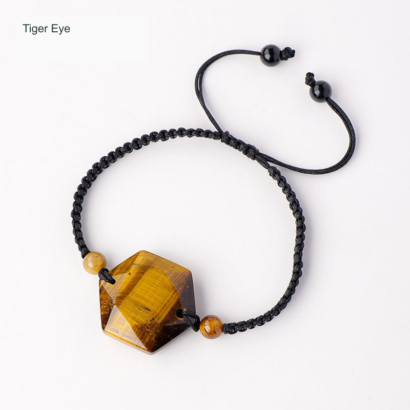 Original faceted geometric stone cord bracelet with English supplier material label; physical bead and cord unchanged