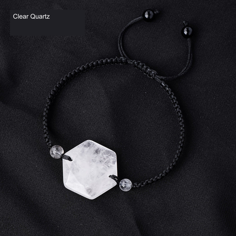 Original faceted geometric stone cord bracelet with English supplier material label; physical bead and cord unchanged