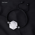 Original faceted geometric stone cord bracelet with English supplier material label; physical bead and cord unchanged