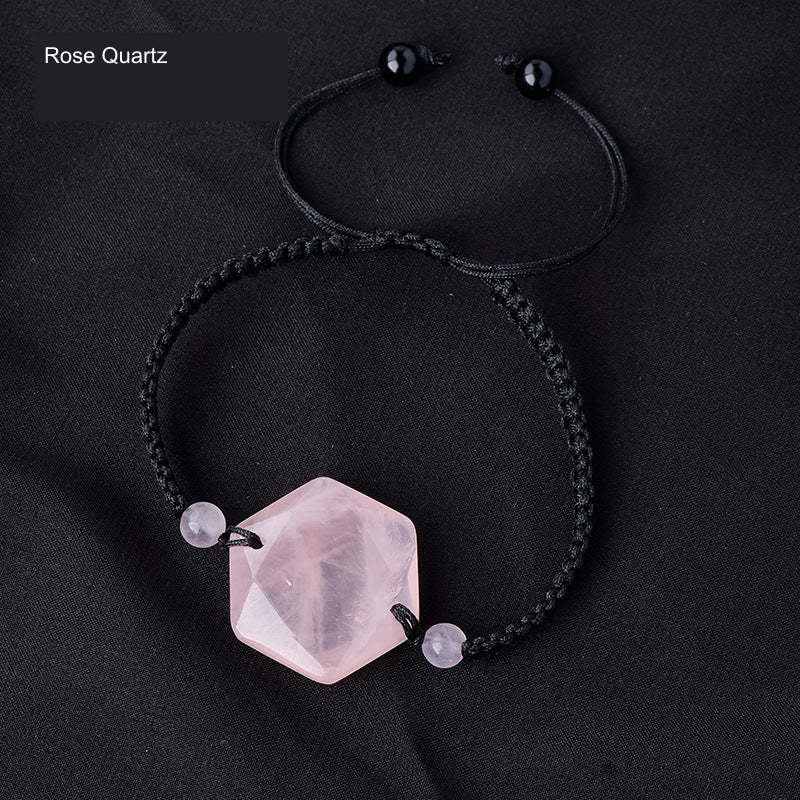 Original faceted geometric stone cord bracelet with English supplier material label; physical bead and cord unchanged