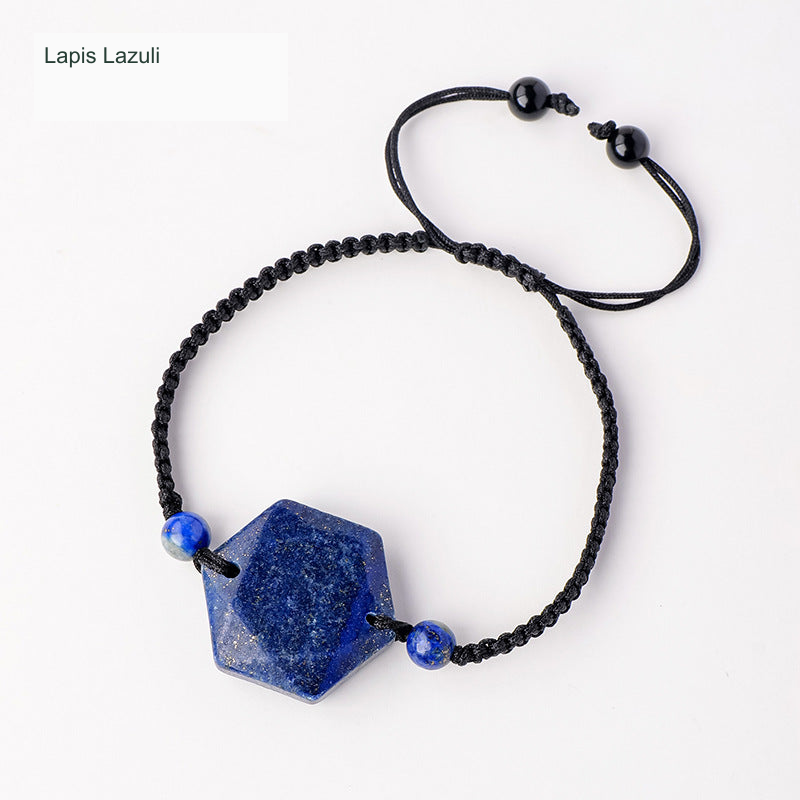 Original faceted geometric stone cord bracelet with English supplier material label; physical bead and cord unchanged
